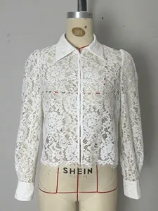Lace long sleeve shirt with floral hollow out fabric and eyelash hem detailing