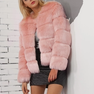 Chic pink faux fur short jacket with tiered plush texture shown on a stylish model