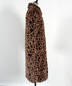 Close-up detail of leopard print faux fur coat showing soft texture and pattern