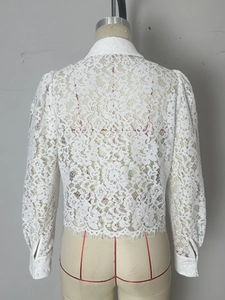 White long sleeve lace shirt with floral pattern, bubble sleeves and eyelash lace hem detail