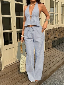 Detail of blue and white striped halter top with drawstring wide-leg pants set