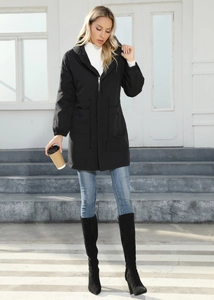Detail view of a black hooded mid-length windbreaker with a drawstring waist and zipper