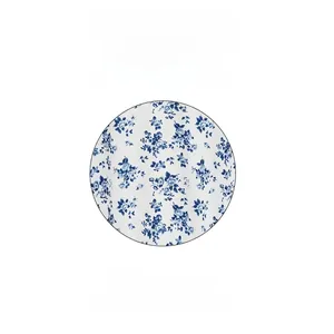 Detailed macro view of soft white floral fabric with visible woven texture and pattern