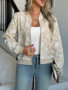 Giacca beige con ricamo floreale, trama jacquard e chiusura a zip dallo stile raffinato