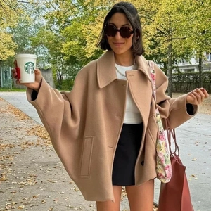 Women's camel loose wool coat with lapel collar and casual autumn outdoor style