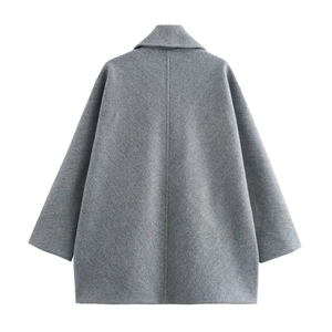 Back view of a grey wool blend jacket with oversized sleeves and relaxed cocoon silhouette