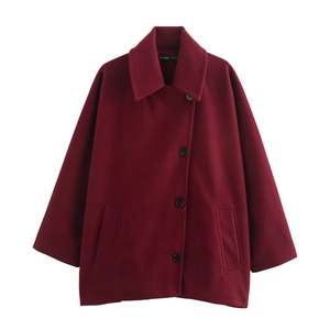 Women's burgundy single-breasted wool jacket with wide lapels and oversized fit