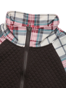 Close-up of quilted brown fabric and colorful plaid pattern stand collar with metal zipper