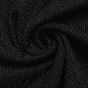 Macro view of black ribbed knit fabric showing fine texture and stretchy material detail