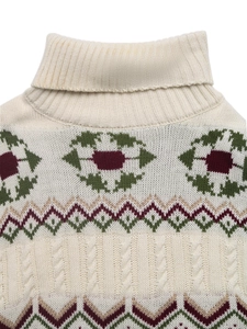 Detail of high neck knit sweater with ethnic jacquard pattern and cable knit texture