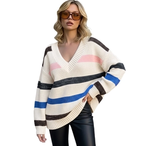 Women's V-neck striped knit sweater in oversized loose fit with multi-color patterns