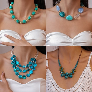 Bohemian beaded shell necklaces in turquoise and gold finish for summer beach vacations