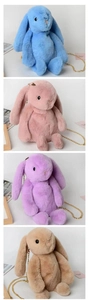 Plush bunny shoulder bags in blue pink purple and beige with gold chain straps