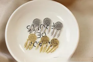 Detaillierte Traumfänger-Anhänger in Gold und Silber für DIY-Schmuckherstellung