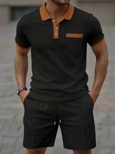 Detail of waffle knit fabric on men's polo set with contrast collar and pocket