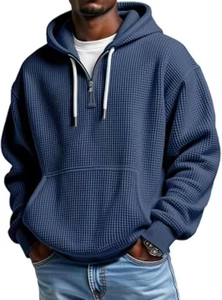 Détail du sweat à capuche bleu marine en maille gaufrée avec fermeture éclair 1/4
