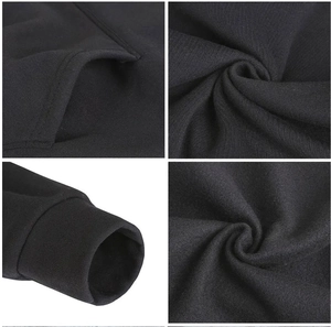 Detail view of black hoodie showing reinforced stitching on kangaroo pocket and ribbed cuffs