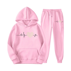 Pink two-piece tracksuit with heart and heartbeat print on hoodie and joggers