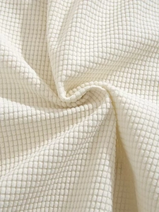 Detailed close-up showing the waffle weave texture of heavy cotton sports shorts