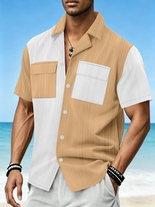 Men's summer short sleeve shirt with color block design and dual pockets on beach