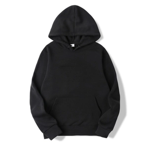 Detailed macro view of black hoodie featuring kangaroo pocket and ribbed cuffs texture