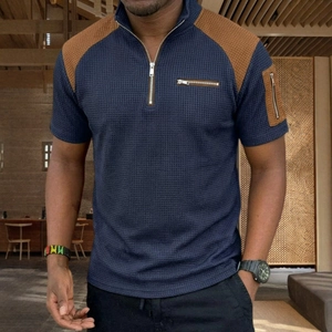 Men's navy blue waffle knit short sleeve polo shirt with brown patchwork and zip details