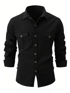 Macro shot of black cotton shirt with double flap pockets and distressed details