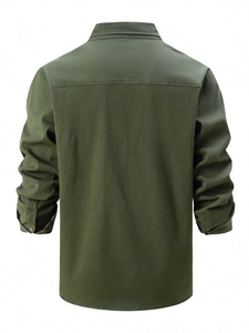 Back view of dark green cotton shirt showing double-needle stitching and fabric texture