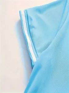 Detail of sky blue breathable mesh fabric on polo shirt with white double stripes