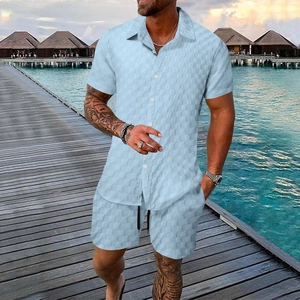 Close-up of men's blue summer set showing textured waffle fabric and drawstring shorts