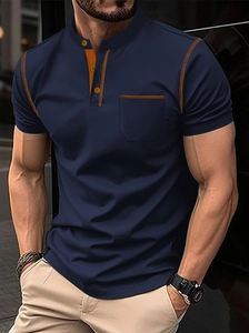 Polo da uomo blu scuro con cuciture a contrasto arancioni e taschino sul petto