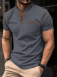 Polo da uomo slim fit grigio scuro con cuciture a contrasto arancioni e taschino