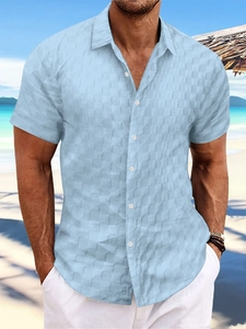 Men's light blue short sleeve shirt with waffle texture and lapel collar for summer beach