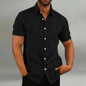 Men's casual black short sleeve shirt with waffle texture and white buttons
