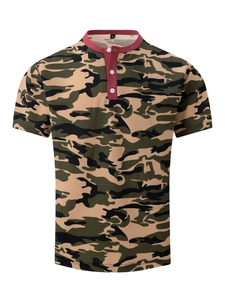 Macro detail of camouflage polo shirt showing red contrast collar and three white buttons