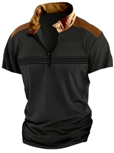 Detail of men's polo shirt featuring a black quarter-zip stand collar and textured fabric