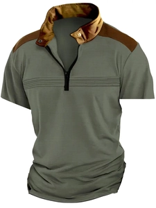 Detail of army green mesh fabric polo with brown leather patchwork and zipper