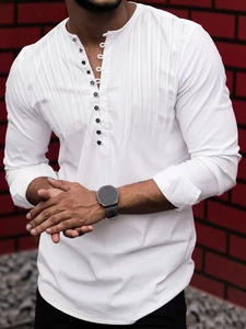 Detail of white men's long sleeve shirt with multi-button collar and vertical pleats