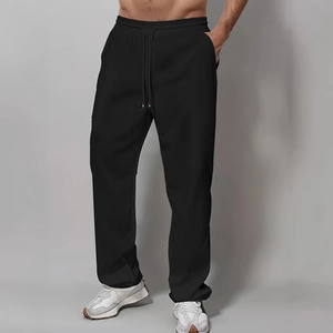 Men's solid black cotton casual pants with elastic drawstring waist and straight fit
