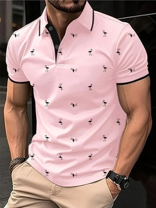 Detail view of men's pink polo shirt with black flamingo print and buttoned collar