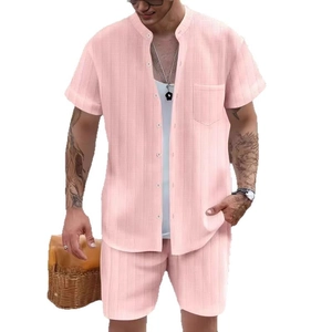 Men's pink short sleeve Henley shirt and shorts set with waffle texture and pocket