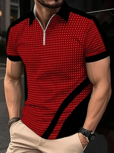 Close-up of red polka dot polo shirt featuring a black collar and silver zipper detail