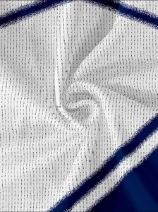 Macro shot of breathable mesh fabric showing vertical dots and quick-dry texture