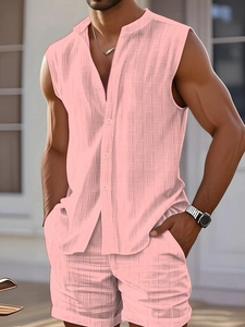 Macro detail of men's pink summer set showing the unique textured waffle knit fabric