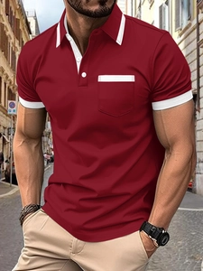 Detail of burgundy polo shirt featuring contrast white stripes on the collar and pocket