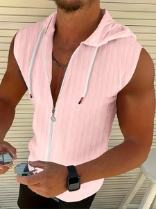Detail of pink sleeveless hoodie for men featuring textured jacquard fabric and a full zipper