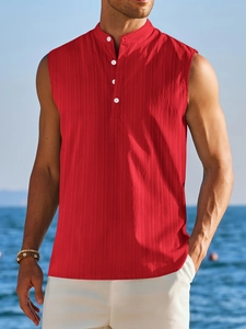 Detail of red sleeveless henley shirt with stand collar and textured fabric for men