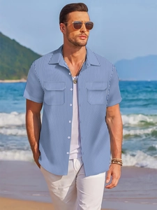 Detail view of men's summer short sleeve striped shirt with front chest pockets