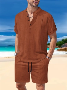 Detailed view of the brick red waffle texture fabric on the Henley neck shirt and shorts