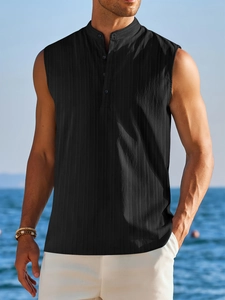 Detail of black sleeveless Henley shirt with stand collar and textured fabric